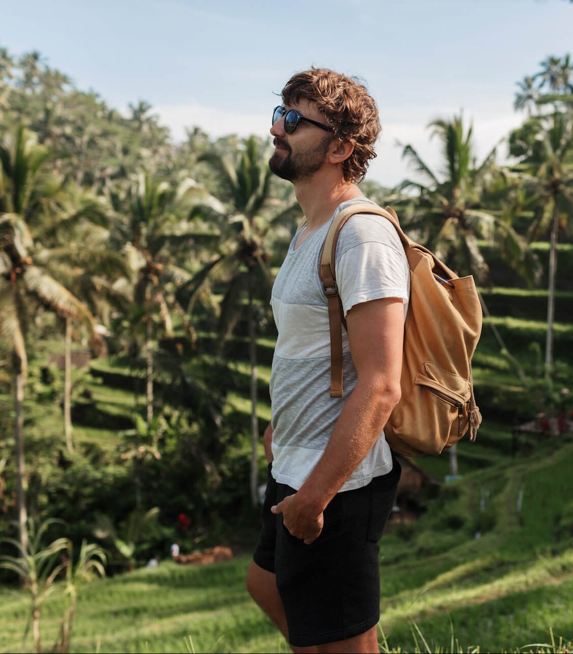 outdoor-portrait-of-handsome-travel-man-with-back-2021-08-31-09-40-54-utc-e1671156185744.jpg